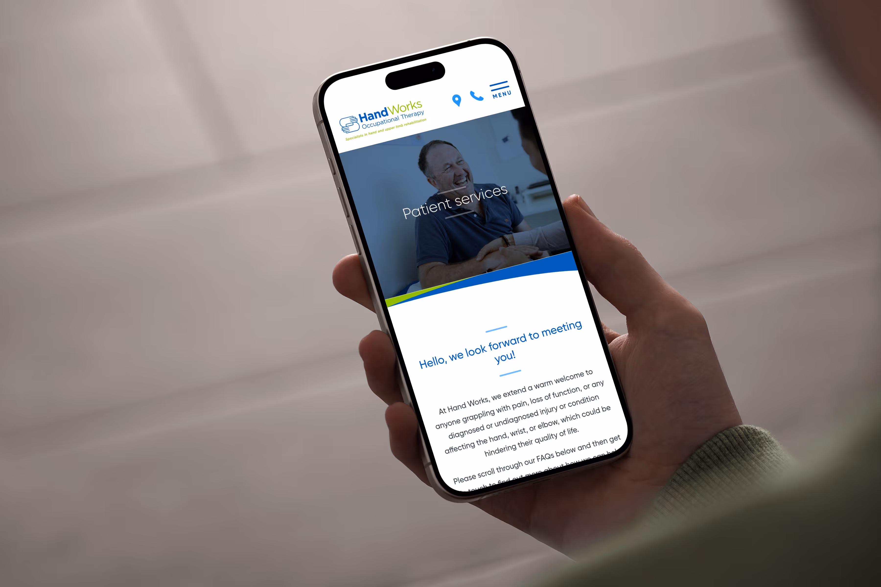 Man using the Handworks website on his iPhone 14 Pro