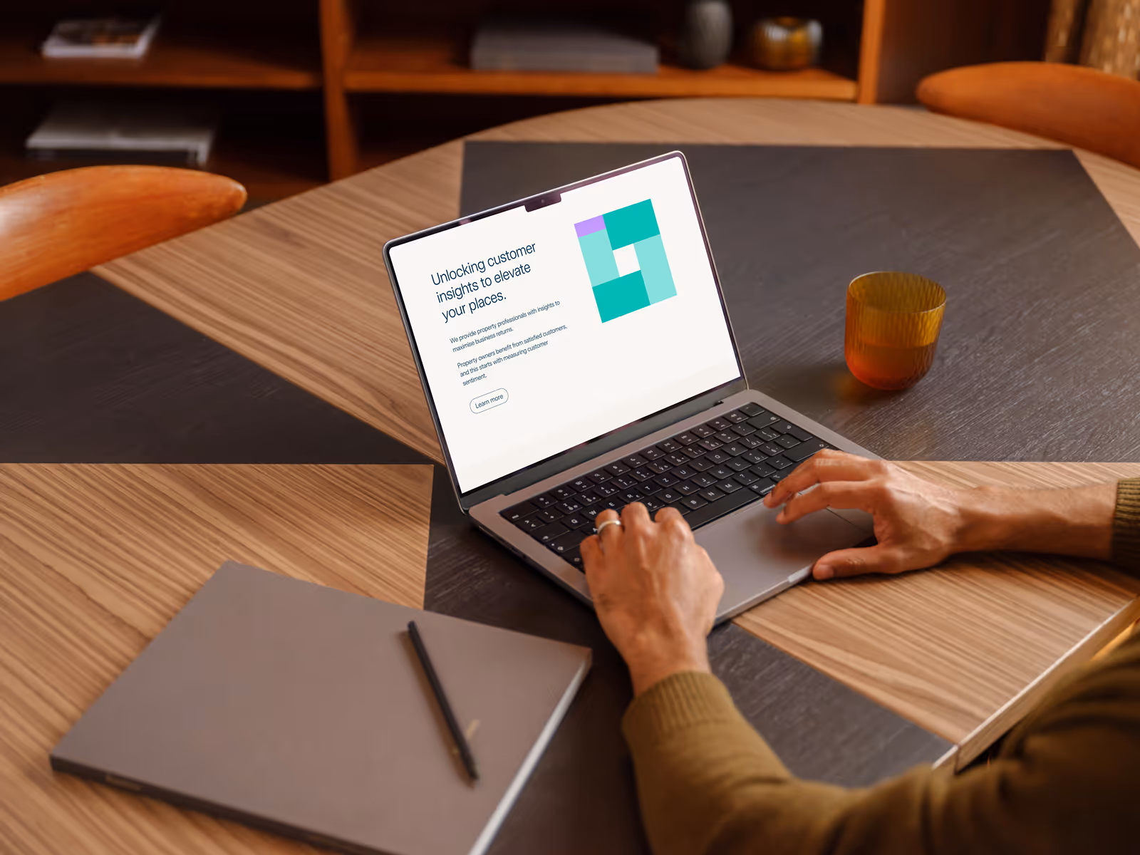 Man browsing Prescient Properties Website on a Laptop